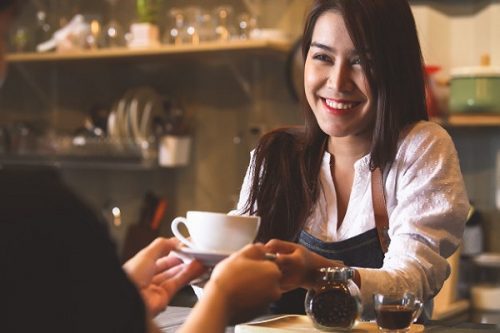 Student waitressing as a part time job while studying abroad
