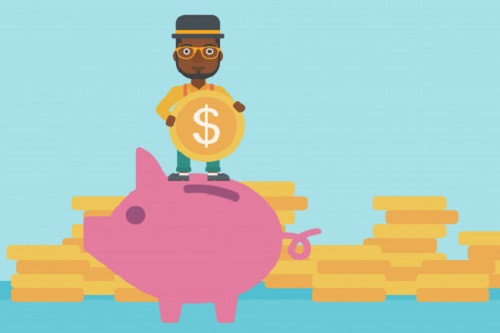 Man standing on a piggy bank holding money