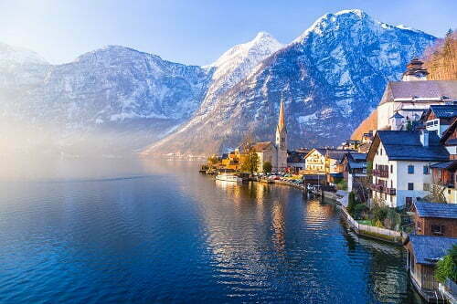 View of famous Hallstatt town with lake and mountains seen in on